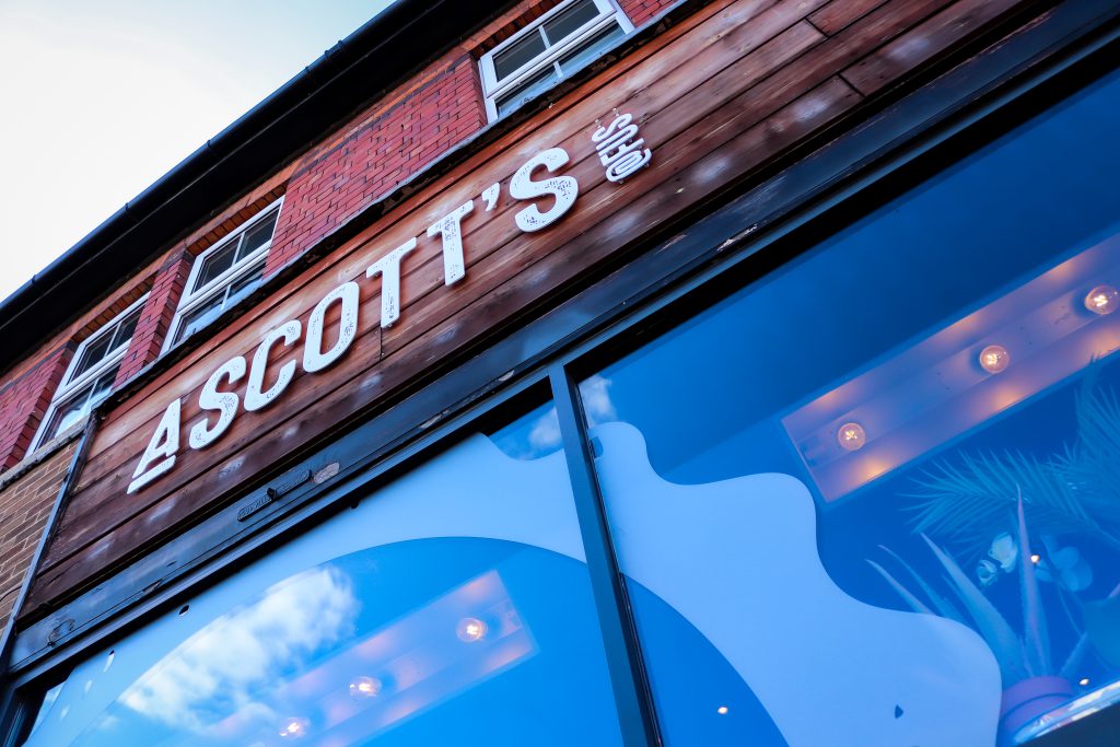 Ascotts Restaurant sign on the building facade in Bromsgrove.