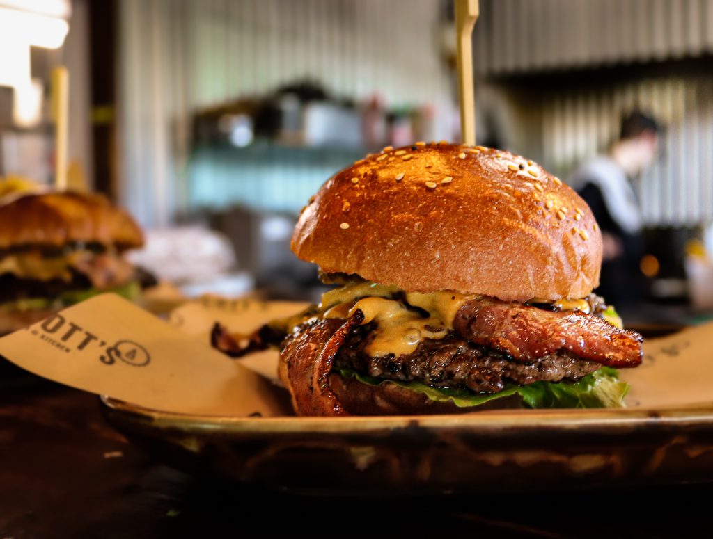 Delicious bacon burger with fresh ingredients served at Ascotts Restaurant, Bromsgrove. Perfect for.