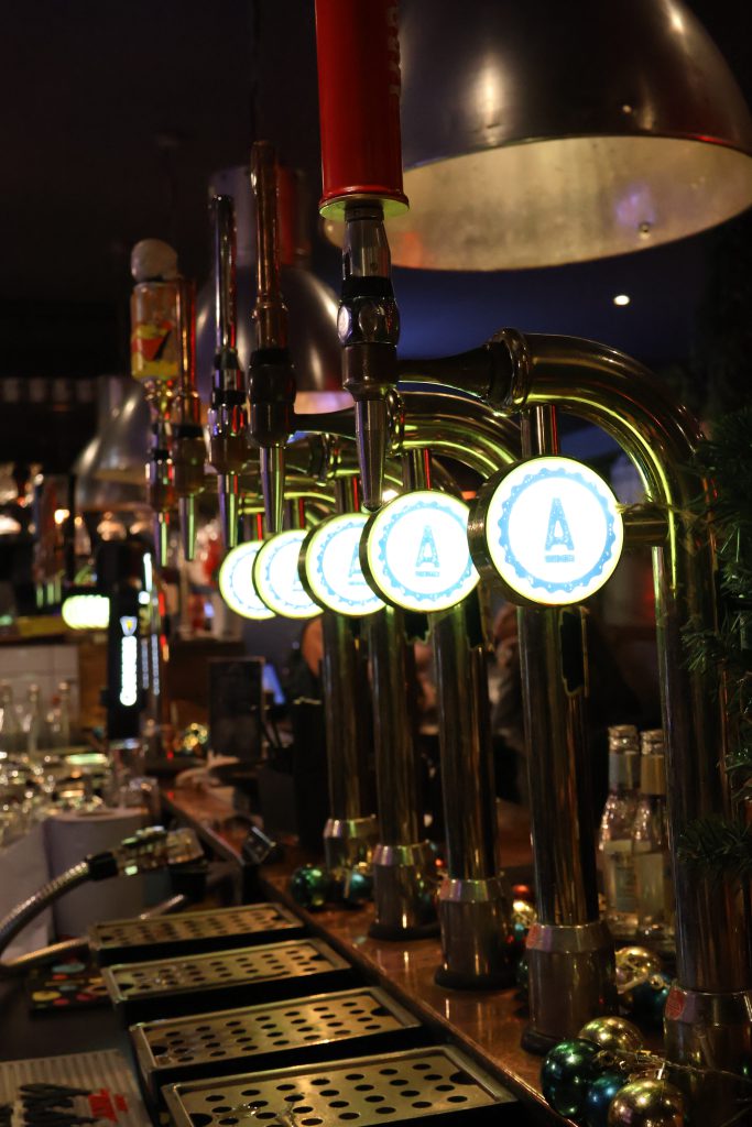 Tap handles and beer taps at Ascotts Sports Bar, perfect for private hire events and gatherings.