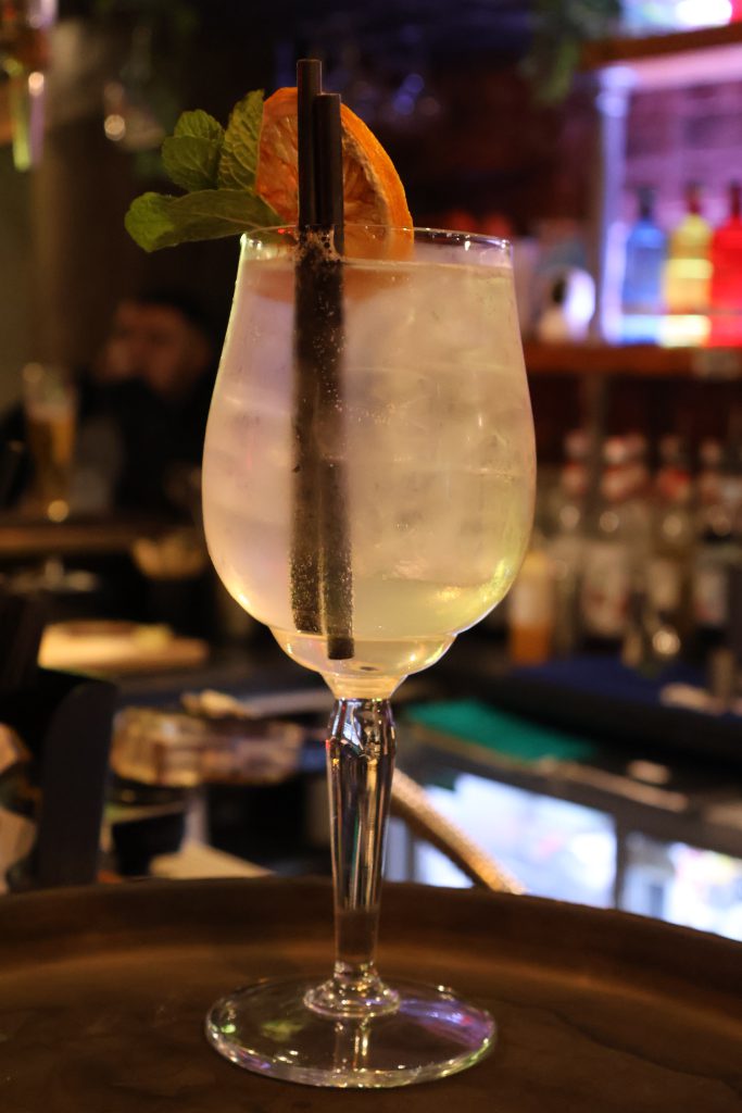 Elegant cocktail with citrus garnish, ideal for private hire at Ascotts Sports Bar.